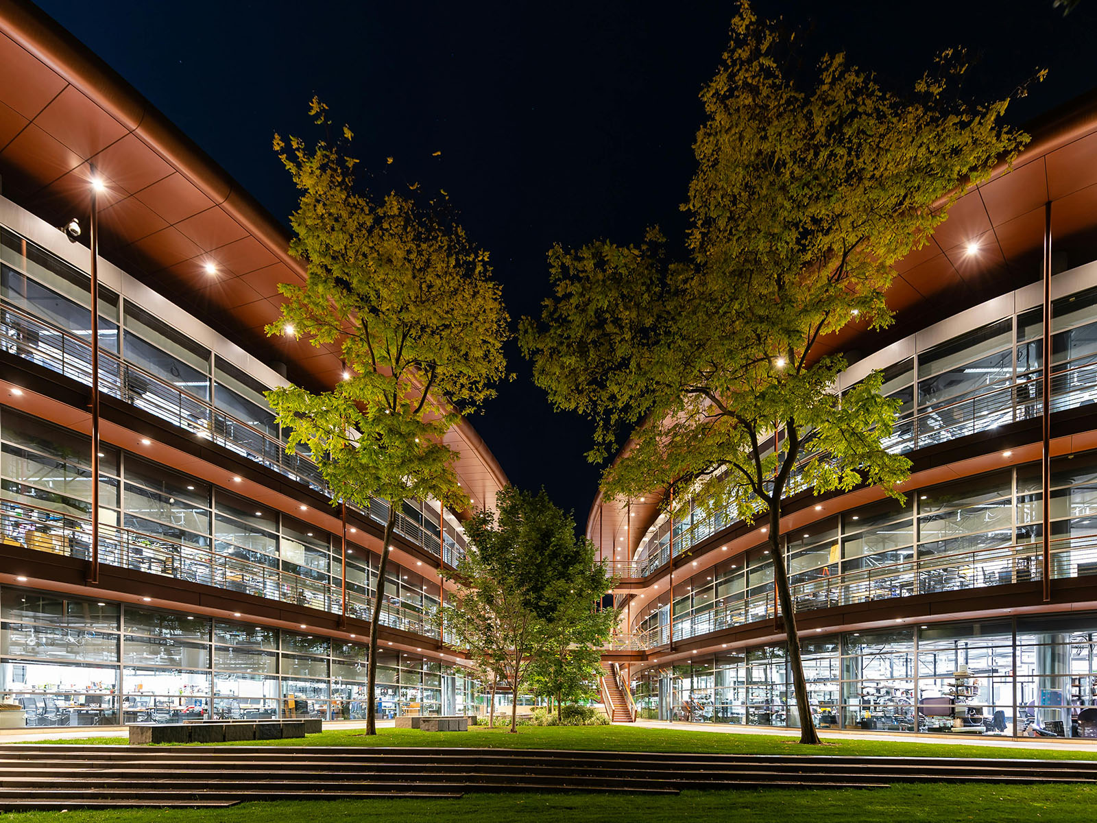 Warren UC - Private International College Consulting - Tips for Navigating the UC System blog post - Brightly lit modern college buildings at night - Pexels Zetong Li