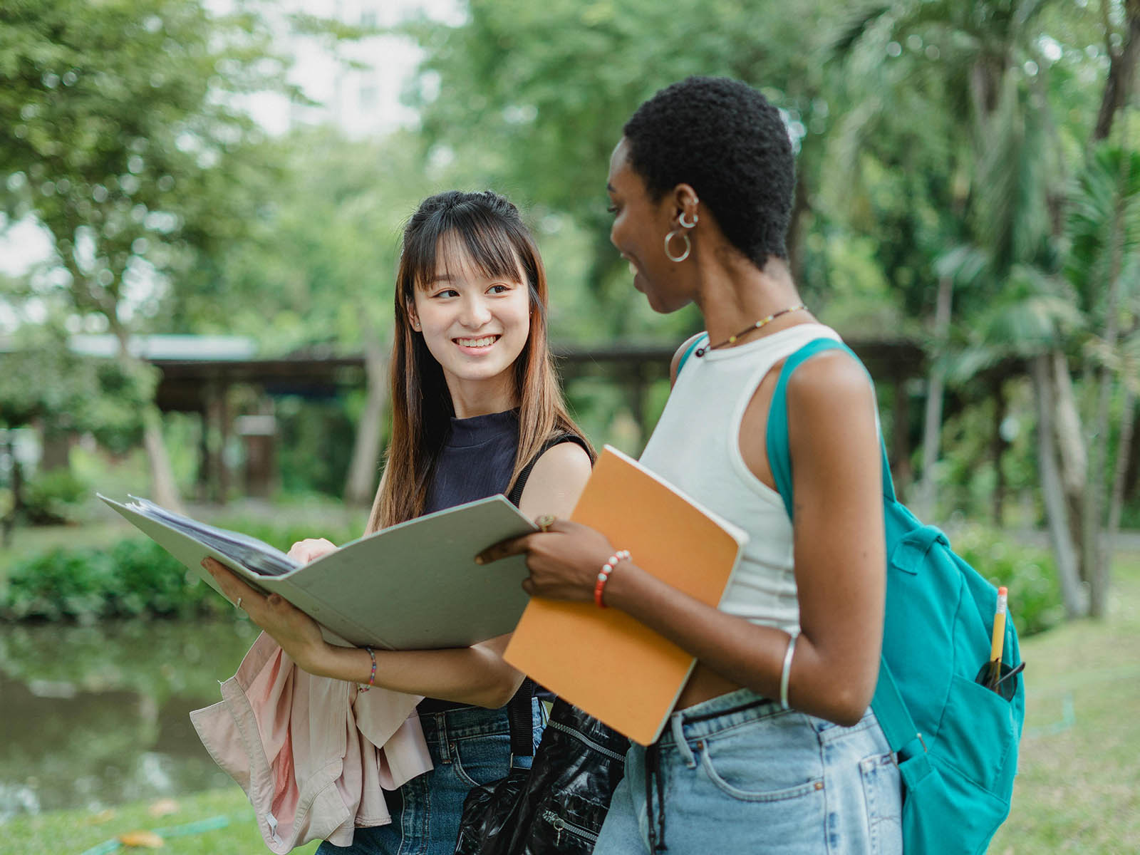 WarrenUC - Private International College Consulting - CC Webinar - Building a Smart Summer Plan- Strategic Moves for a Stronger Application - Two women talking and walking in park - Pexels Zen Chung